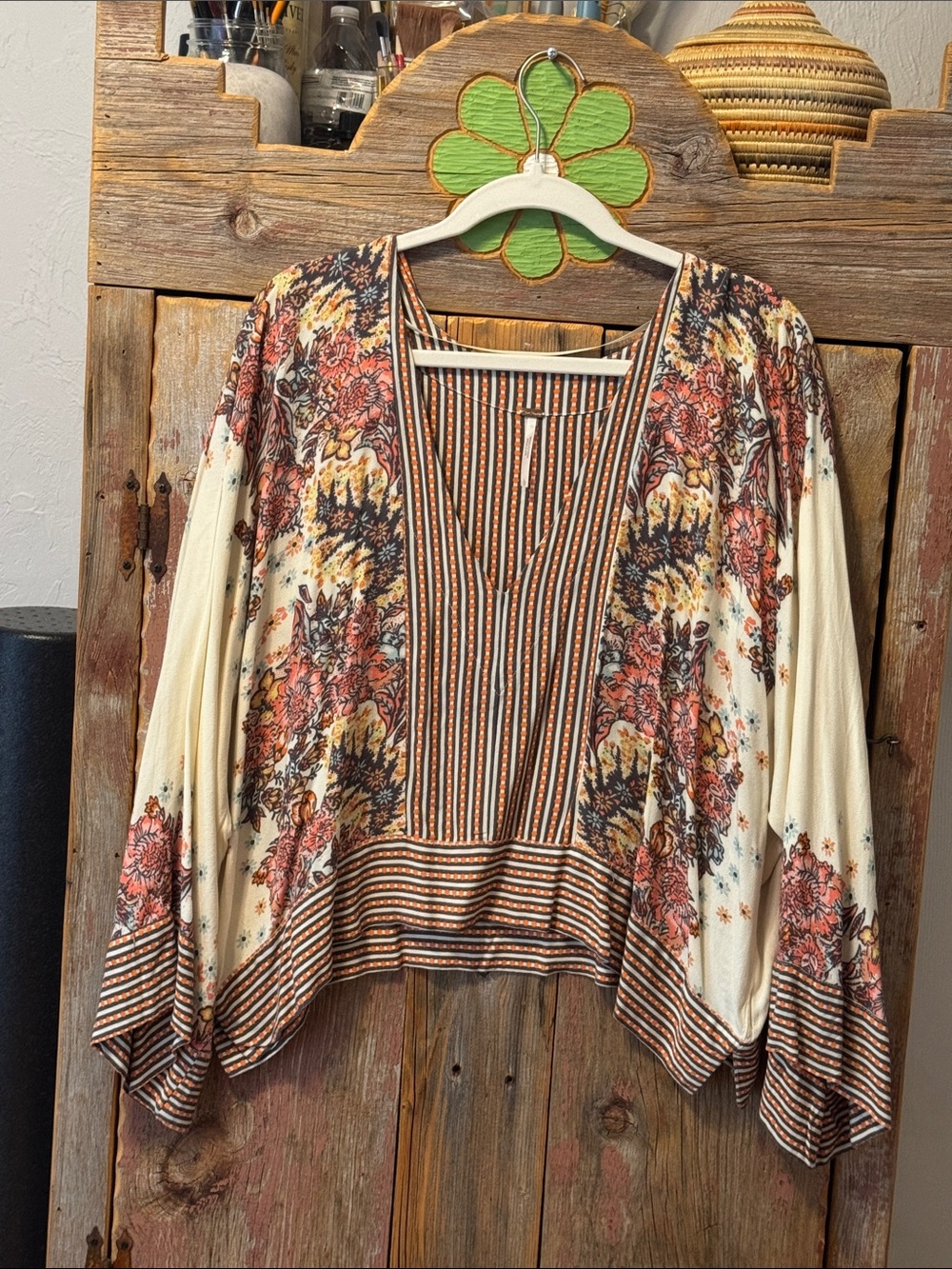 Free People Cream v-neck blouse with Rust & Brown Floral Print. Large NWOT